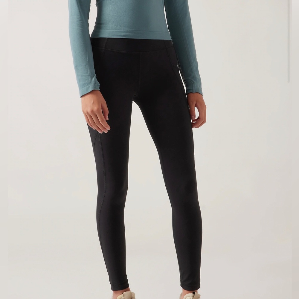 Black Athleta girl leggings, high rise stash your treasures. Size 8/10